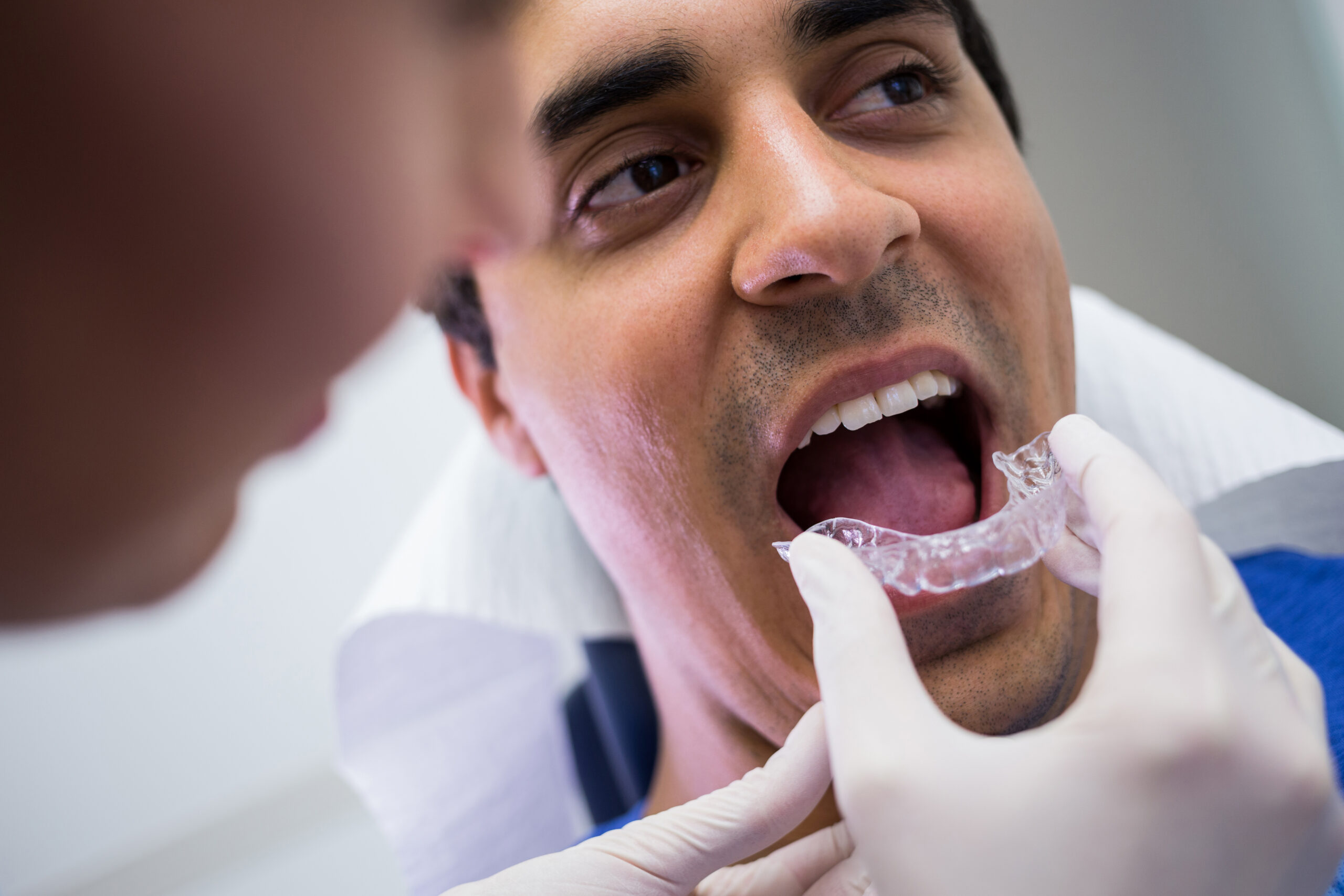 Invisalign for NRIs Visiting India: A Complete Guide by Dr. Mosam Dental & Aesthetic Studio, Ahmedabad